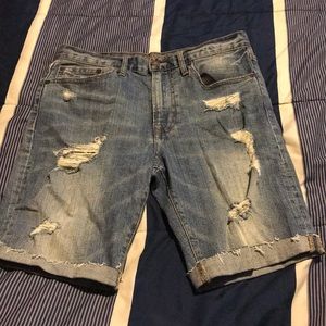 Men’s light wash distressed denim shorts